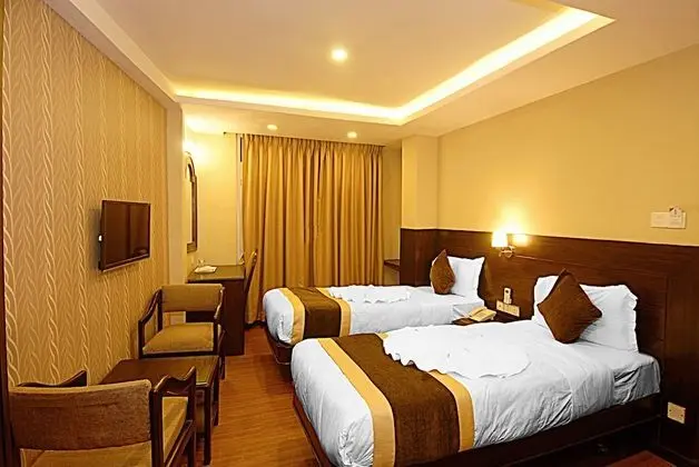 Deluxe Tek Büyük veya İki Ayrı Yataklı Oda