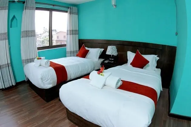 Deluxe Tek Büyük veya İki Ayrı Yataklı Oda, Bahçe Manzaralı