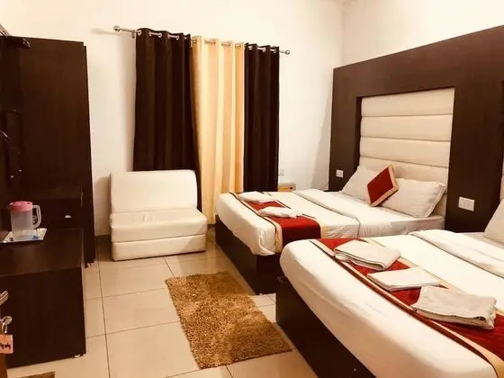 Deluxe Üç Kişilik Oda, Birden Çok Yatak Odası