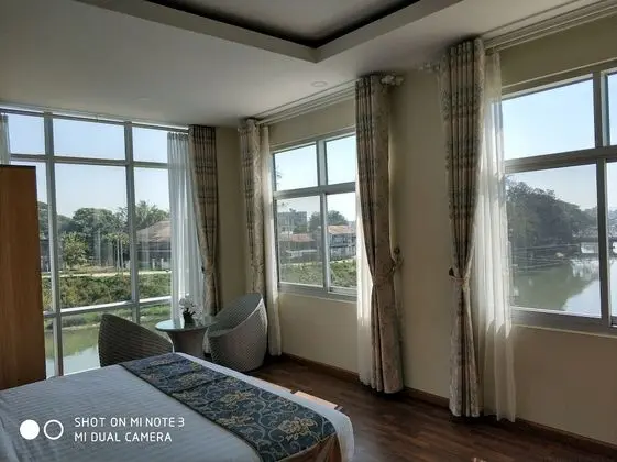 Deluxe Tek Büyük veya İki Ayrı Yataklı Oda, Nehir Manzaralı