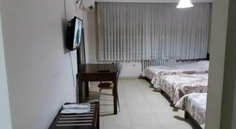 Üç Kişilik Oda