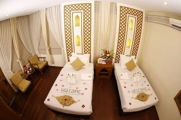 Deluxe Tek Büyük veya İki Ayrı Yataklı Oda