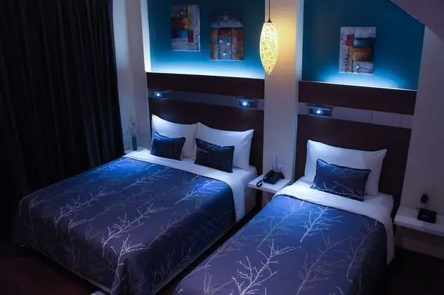 Deluxe Üç Kişilik Oda