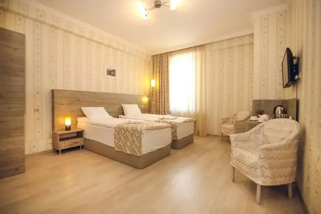 Comfort Tek Büyük veya İki Ayrı Yataklı Oda
