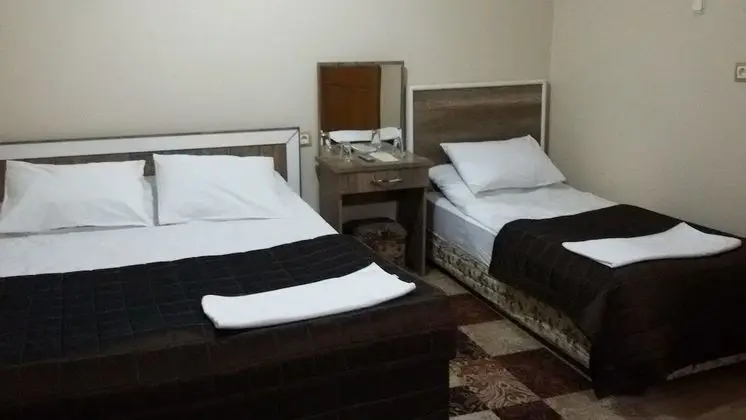Üç Kişilik Oda