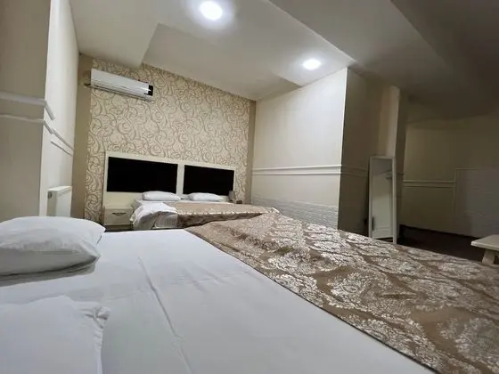 Deluxe Üç Kişilik Oda