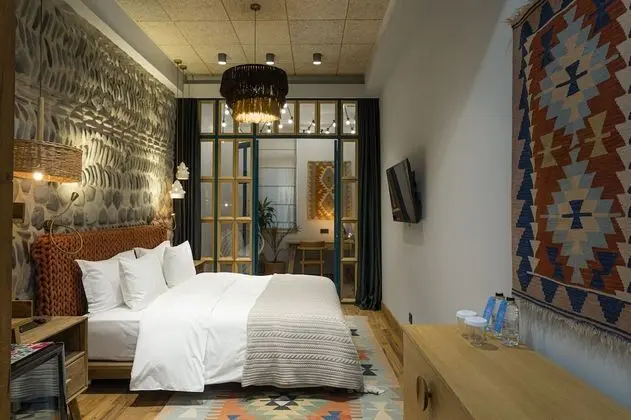 Deluxe Tek Büyük veya İki Ayrı Yataklı Oda