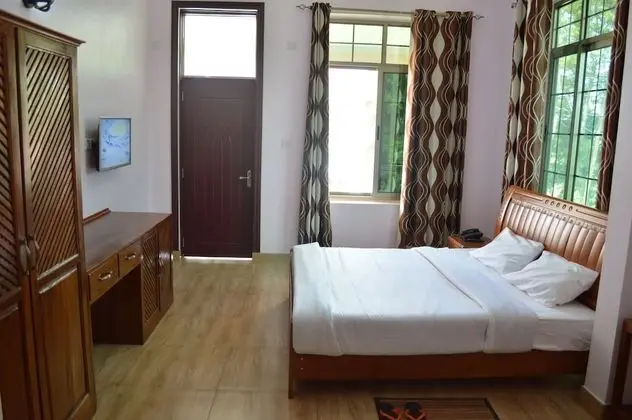 Deluxe Tek Büyük veya İki Ayrı Yataklı Oda