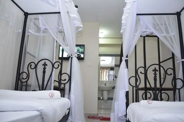 Deluxe Tek Büyük veya İki Ayrı Yataklı Oda