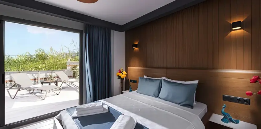 Deluxe Bahçe Manzaralı Üç Kişilik Oda