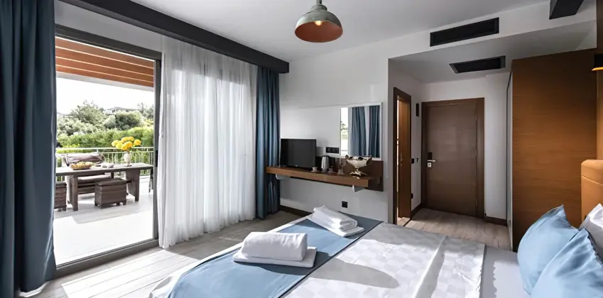 Deluxe Bahçe Manzaralı Üç Kişilik Oda