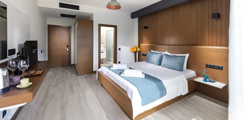 Deluxe Bahçe Manzaralı Üç Kişilik Oda