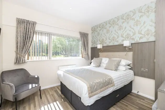 Deluxe Tek Büyük veya İki Ayrı Yataklı Oda