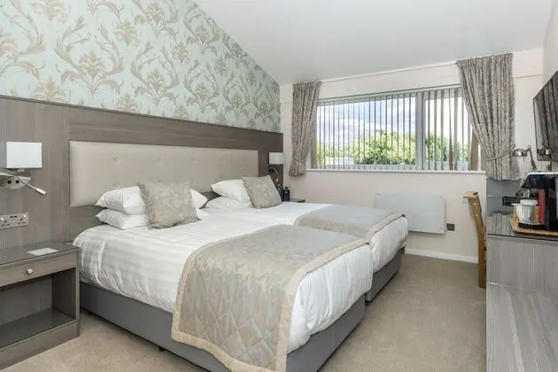 Deluxe Tek Büyük veya İki Ayrı Yataklı Oda