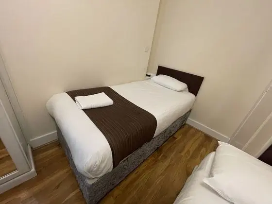Üç Kişilik Oda