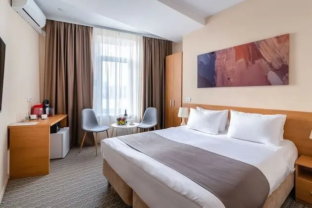 Deluxe Tek Büyük veya İki Ayrı Yataklı Oda
