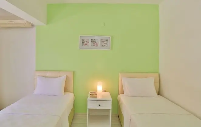 Üç Kişilik Oda