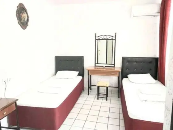 Üç Kişilik Oda