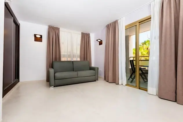 Double Room with Lounge (3 Adults - 1 Child)