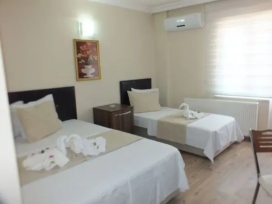 Üç Kişilik Oda