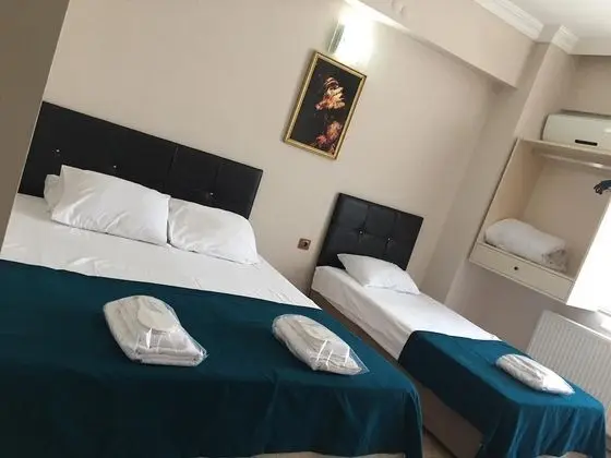 Üç Kişilik Oda