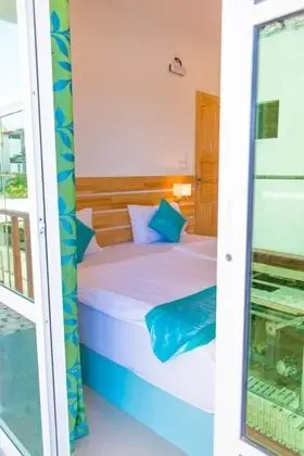 Deluxe Tek Büyük veya İki Ayrı Yataklı Oda