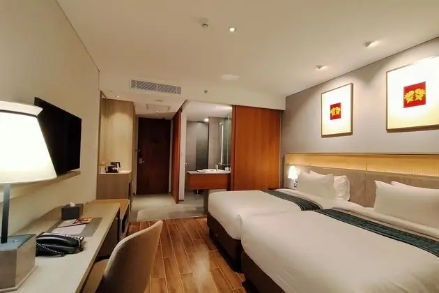 Deluxe Tek Büyük veya İki Ayrı Yataklı Oda