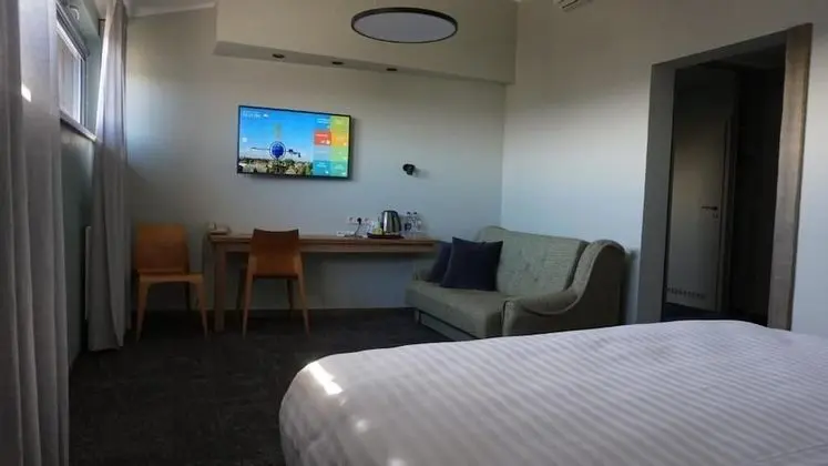 Comfort Tek Büyük veya İki Ayrı Yataklı Oda (Plus)