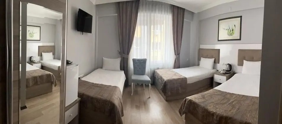 Economy Üç Kişilik Oda