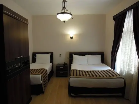 Üç Kişilik Oda