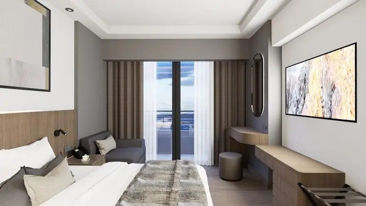 https://images.etstur.com/imgproxy/resize/2560x1440/files/images/hotelImages/etsrooms/282/Korumar_Hotel_De_Luxe_20260203142235_2.png