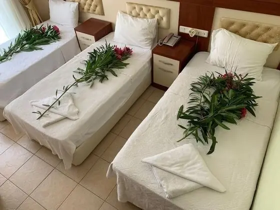 Üç Kişilik Oda