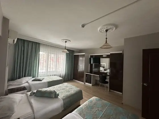 3 Ayrı Yataklı Triple Oda