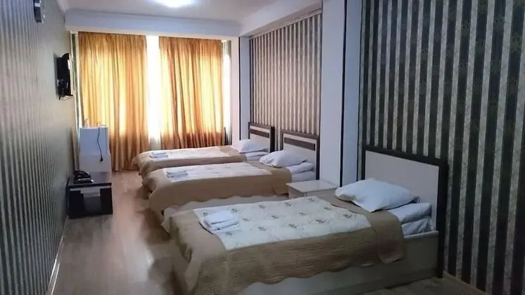 Üç Kişilik Oda