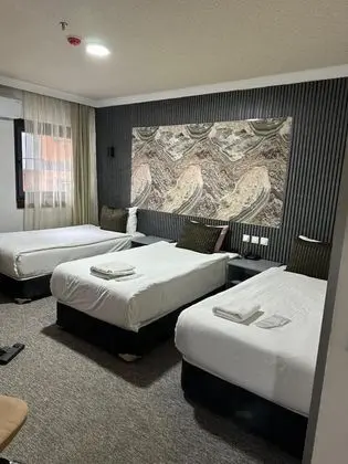 Triple, Bahçe Manzaralı