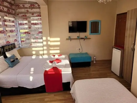 4 KİŞİLİK AİLE ODASI (+1 Çocuk)