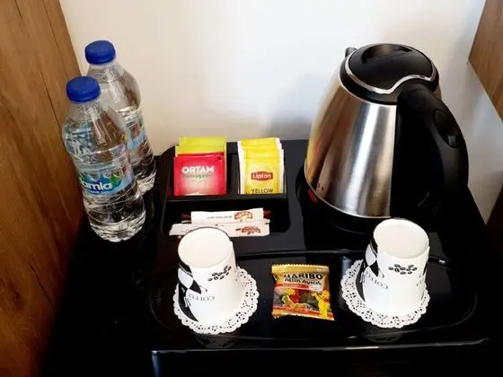 Deluxe Uc Kisilik Oda