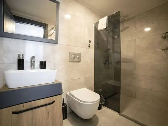 Deluxe Uc Kisilik Oda