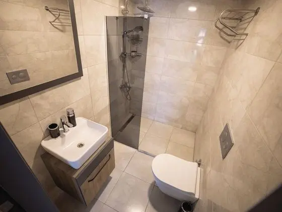 Deluxe Uc Kisilik Oda