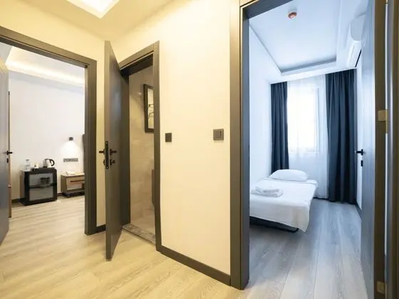 Deluxe Uc Kisilik Oda
