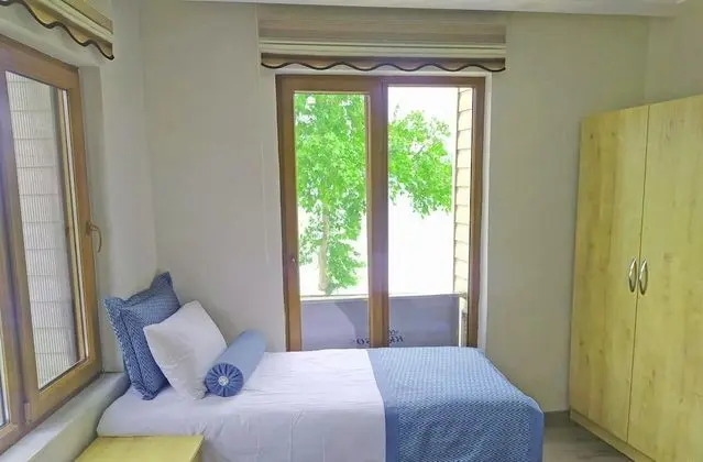 Üç Kişilik Oda