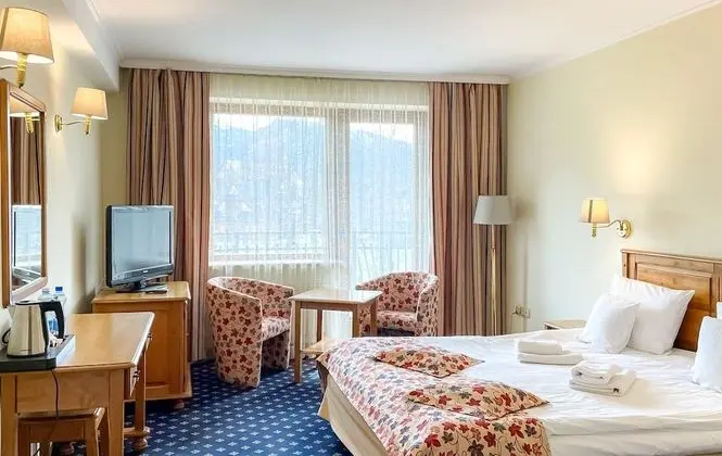 Classic Tek Büyük veya İki Ayrı Yataklı Oda