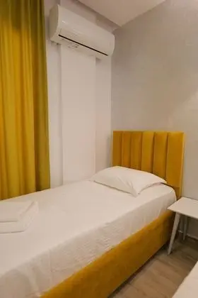 Üç Kişilik Oda, Balkon