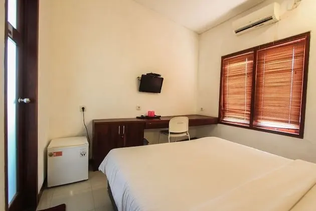 Deluxe Tek Büyük veya İki Ayrı Yataklı Oda