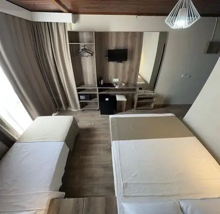 Üç Kişilik Oda
