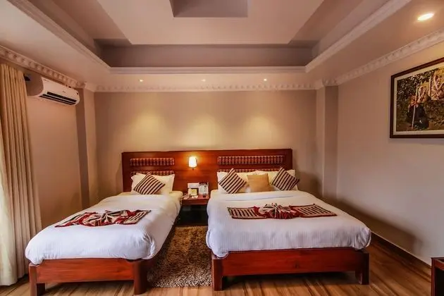 Deluxe Tek Büyük veya İki Ayrı Yataklı Oda