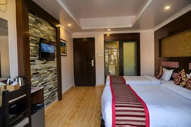 Deluxe Tek Büyük veya İki Ayrı Yataklı Oda