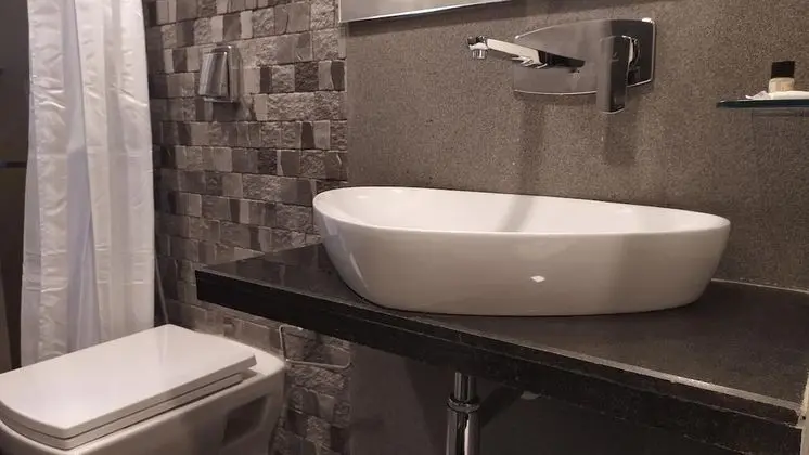 Deluxe Tek Büyük veya İki Ayrı Yataklı Oda