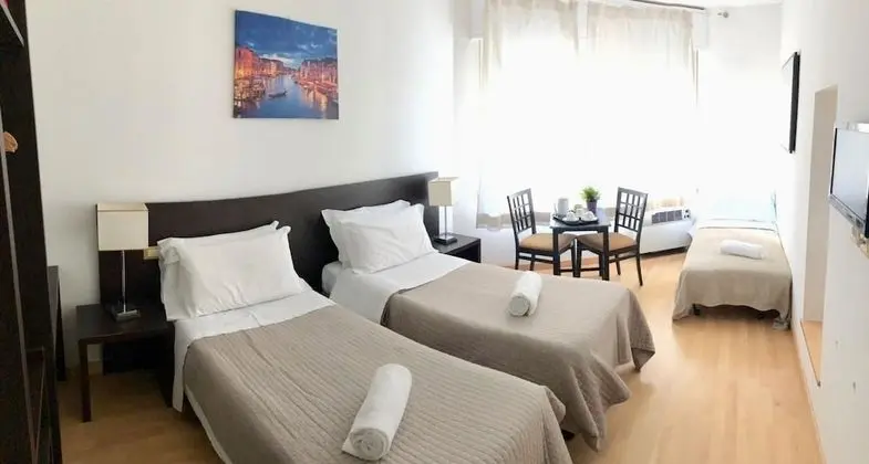 Üç Kişilik Oda
