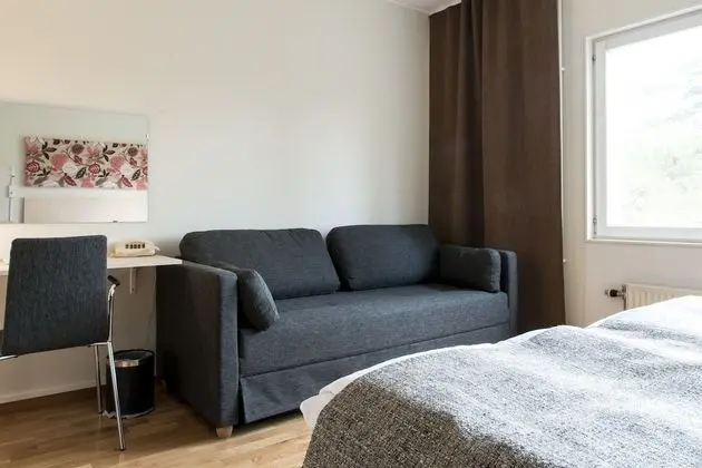 Üç Kişilik Oda (1 single bed and 1 sofa bed)